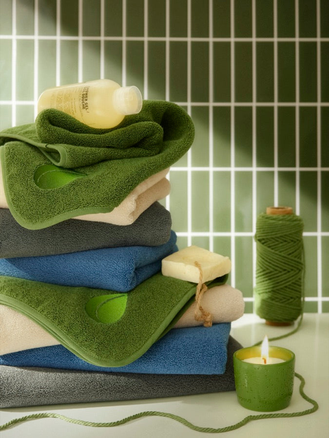 Cascadia towels — stacked with bathroom props