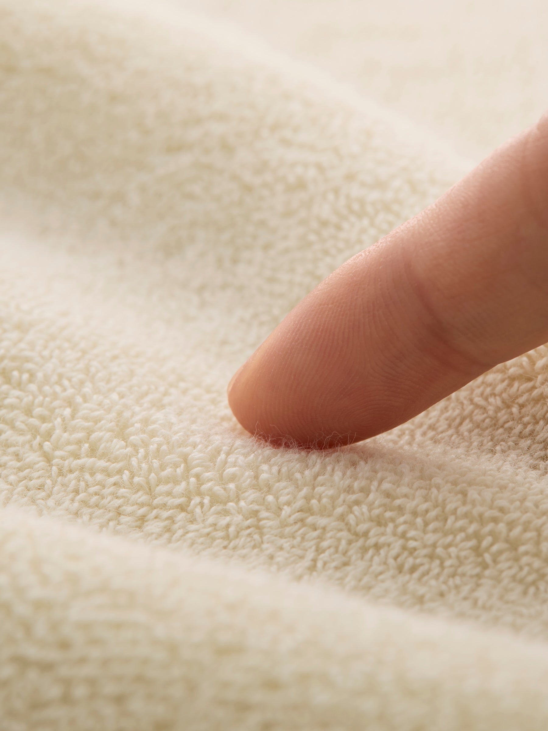 Pressing into the Cascadia towel surface — softness demonstration